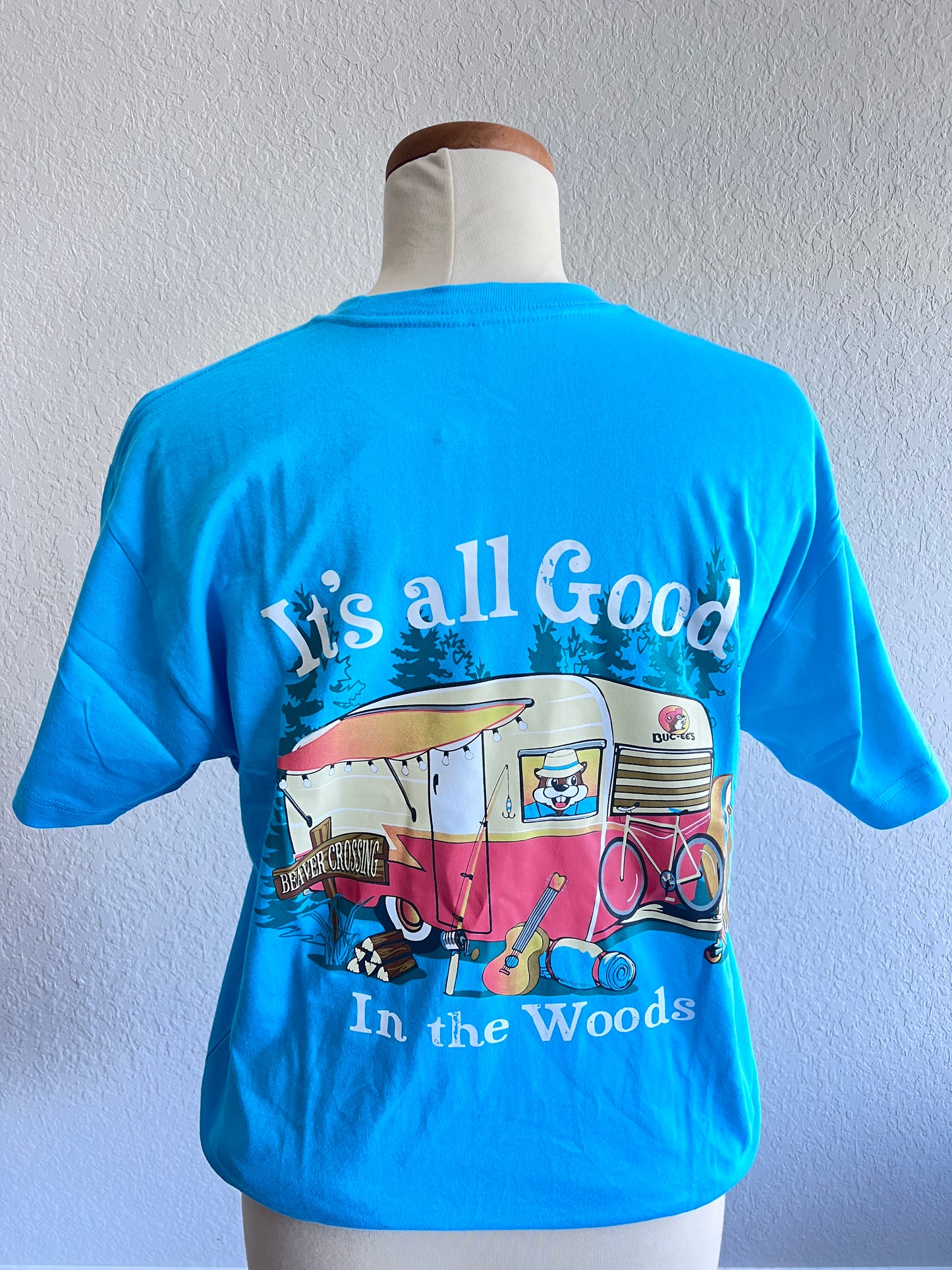 Back of Blue It's all Good in the Woods Shirt with Red Buc-ee's Camper