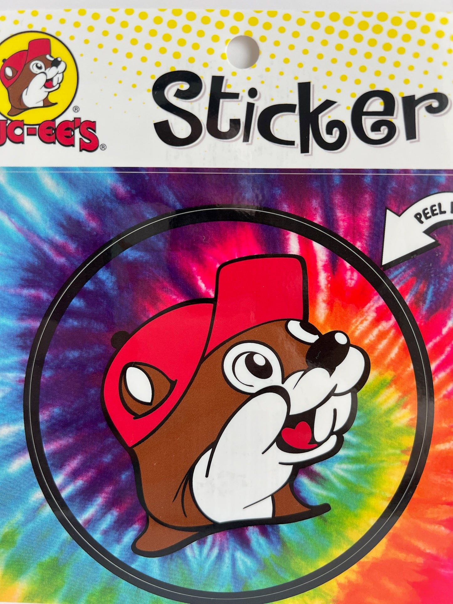 Round tie-dye Buc-ee's sticker with an image of a beaver wearing a red hat