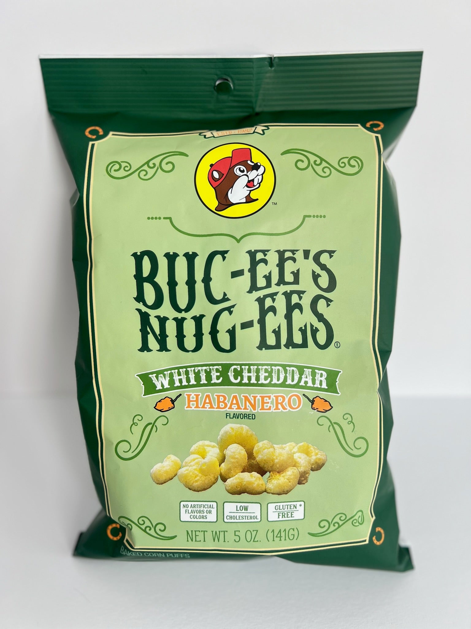 A sage colored 5oz bag of buc-ee's Nug-ees white cheddar habanero flavored